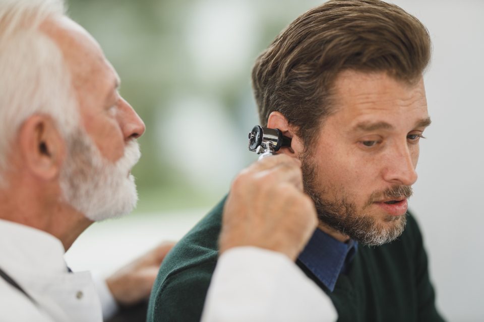 A clinician examining a client