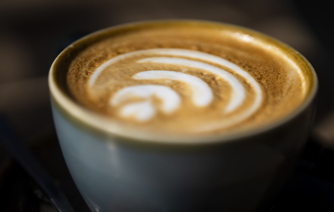 A flat white — about how long a Siggy identity check takes